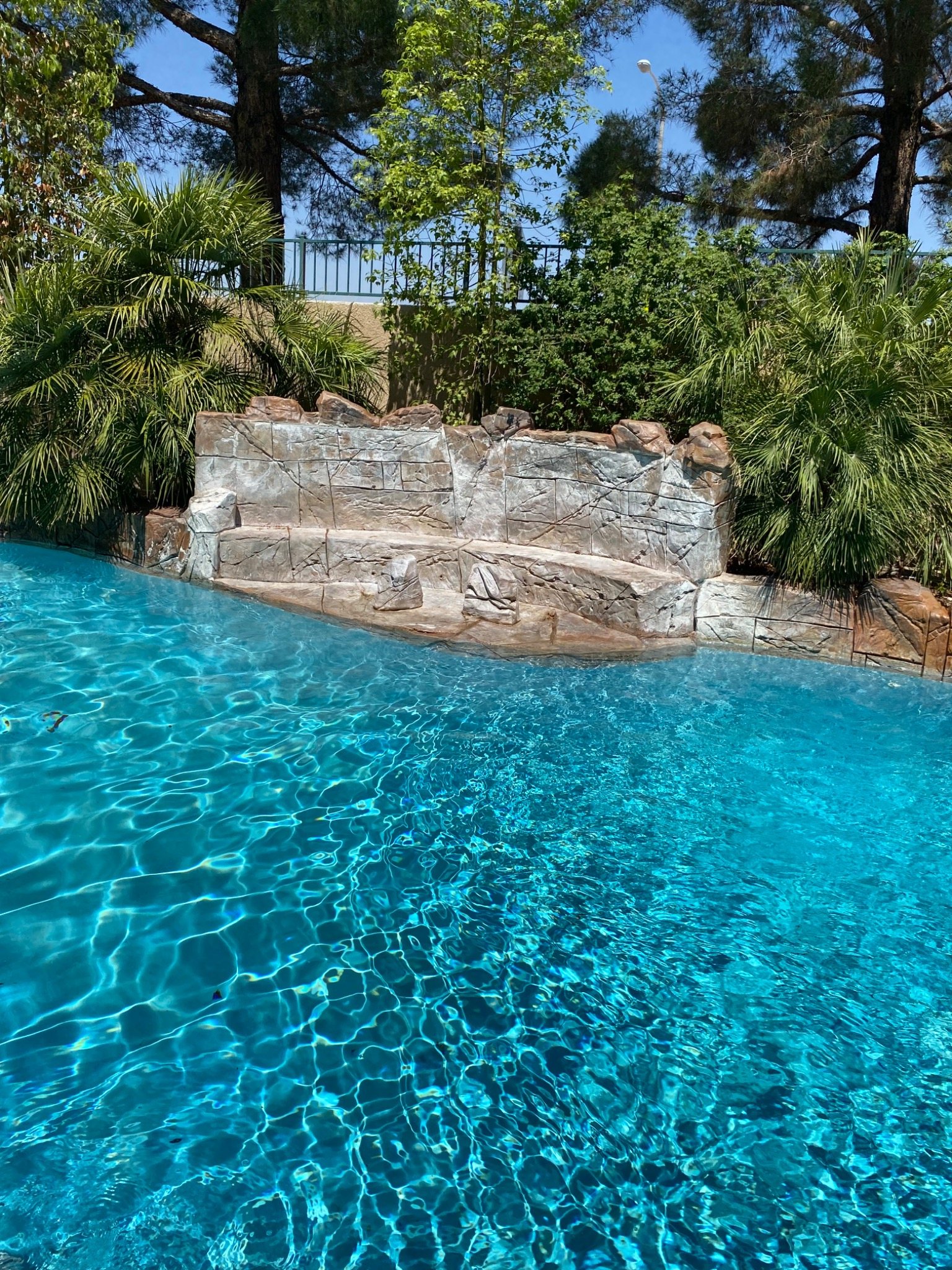 Crystal clear pool maintained by Coastal Blue Pools